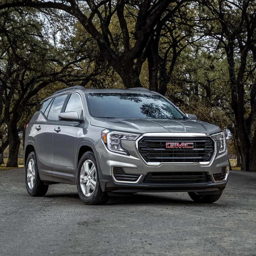 Silver 2024 Terrain parked under the trees