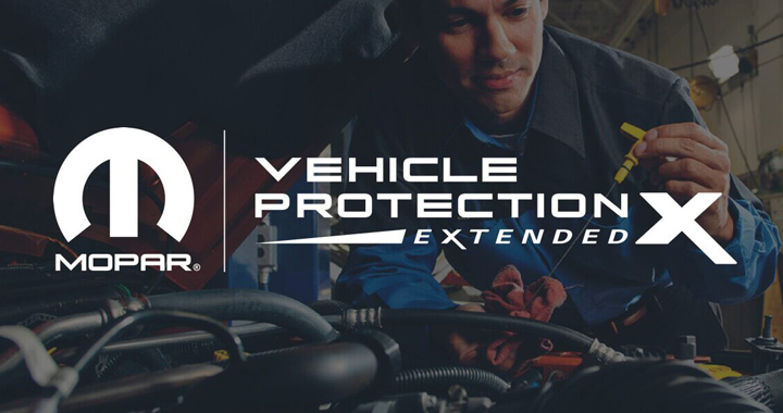 Mopar Service Mopar Technician performing an oil change