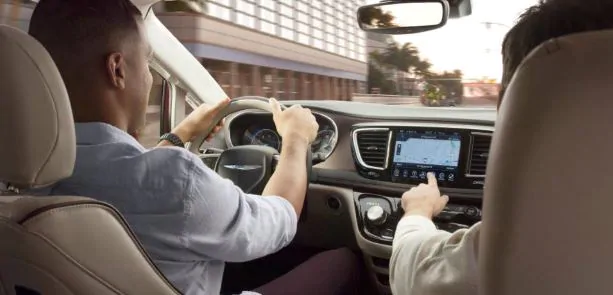 UConnect Navigation Couple using the navigation touch screen
