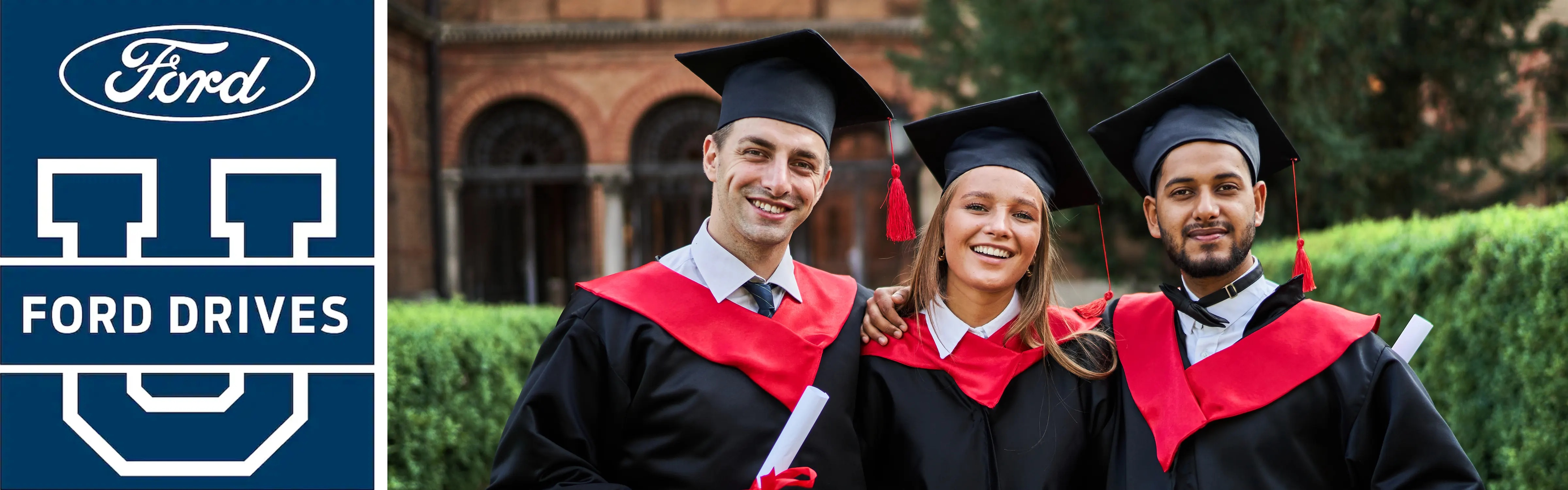 Three college grads smiling