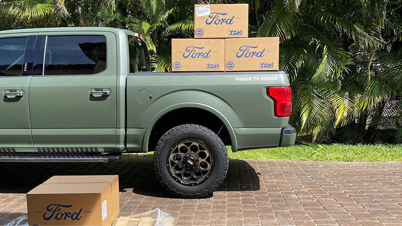 Kayser Ford Military Appreciation Program Ford pickup truck with boxes in the bed