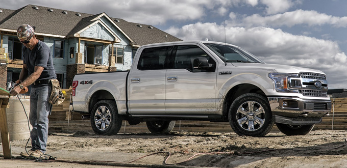 Should I lease or buy Kayser Ford of Sauk City 2020 Ford F-150 XLT SuperCrew in Oxford White at a construction site
