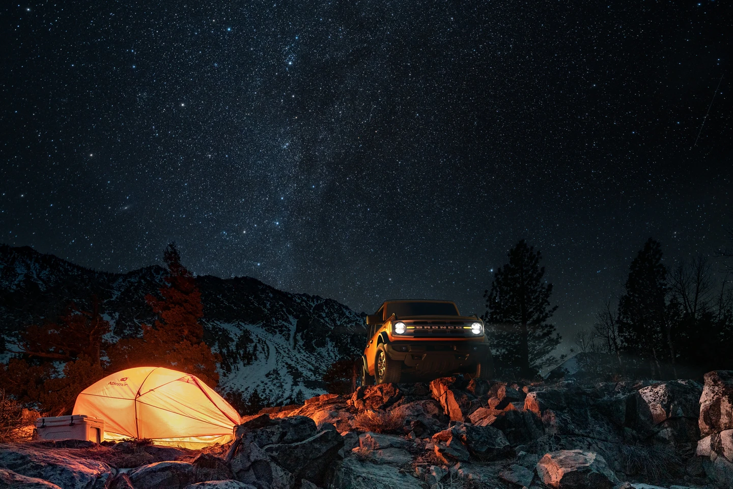 2022 Bronco for sale in Madison, WI Bronco parked on rocks, next to a tent