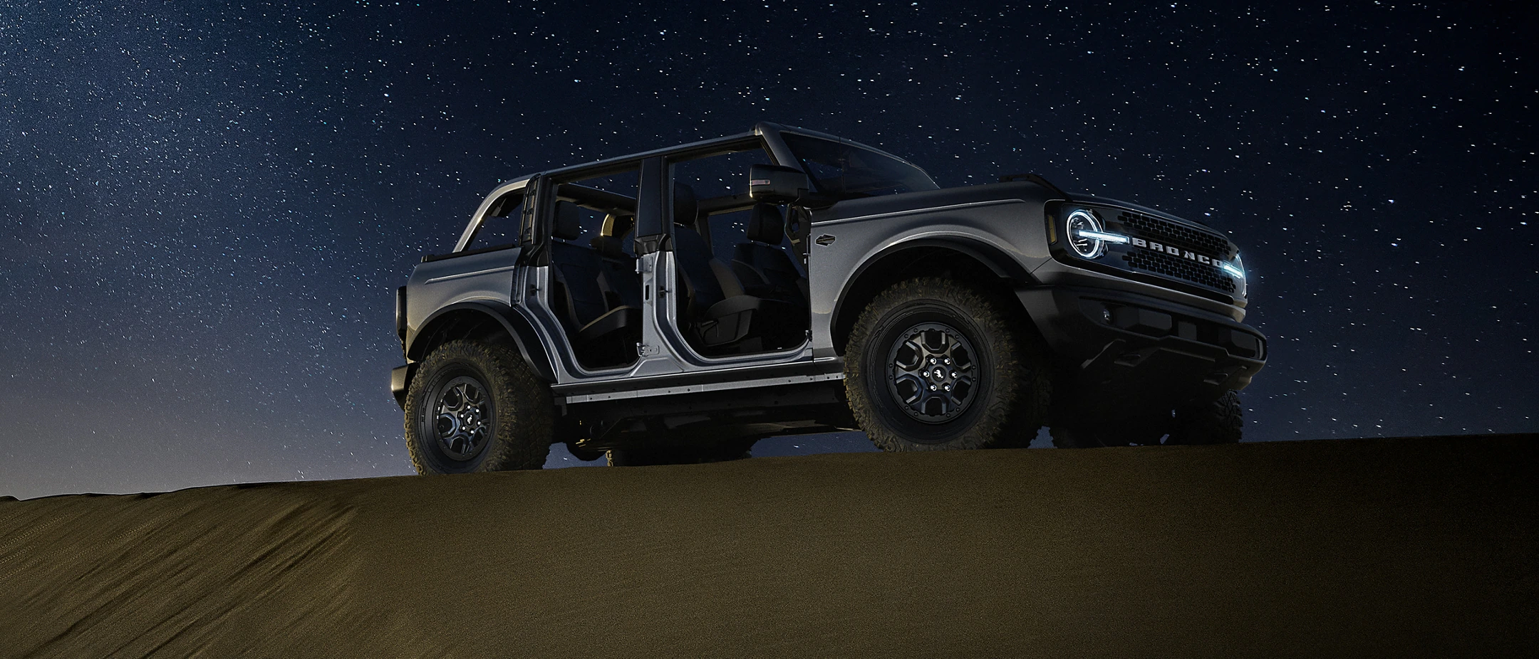 2022 Ford Bronco for sale in Madison, WI Gray Ford Bronco outdoors under the stars