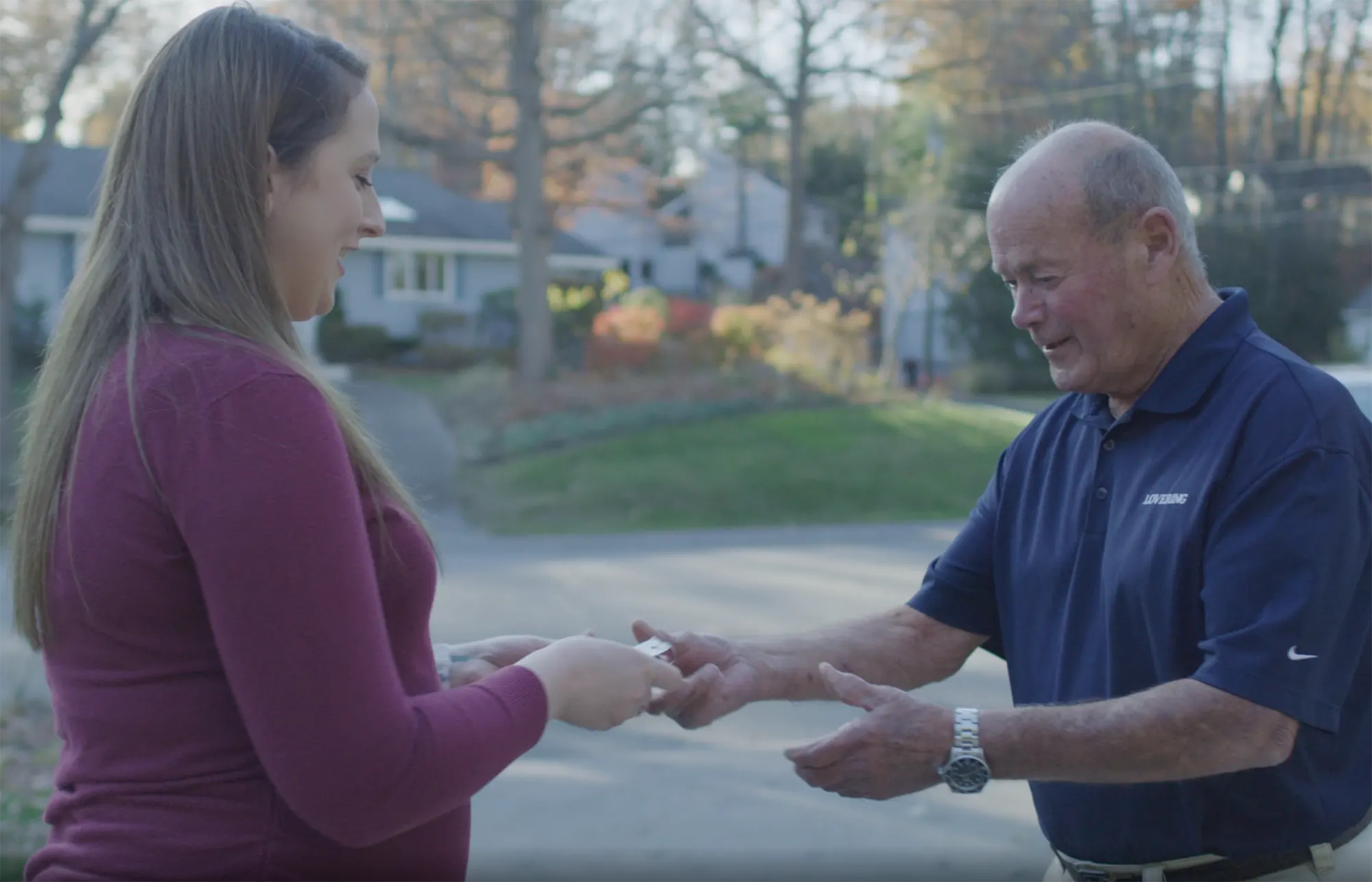 Test Drive Wherever You Are A customer receiving keys for an at-home test drive