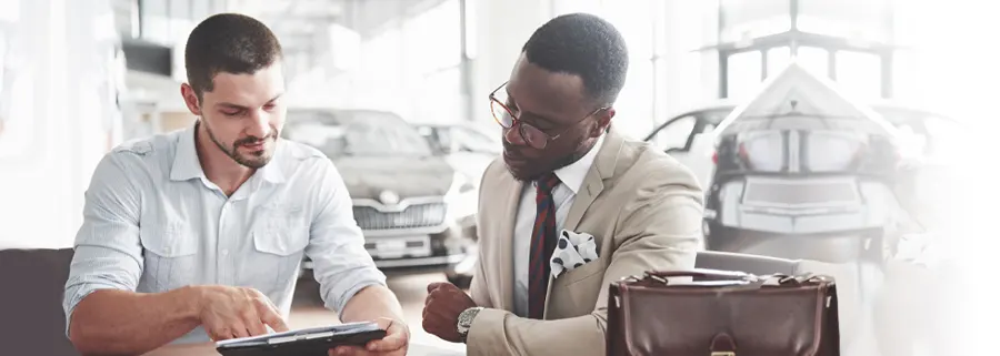 Volvo Lease Payments Volvo Salesman discussing options with a customer
