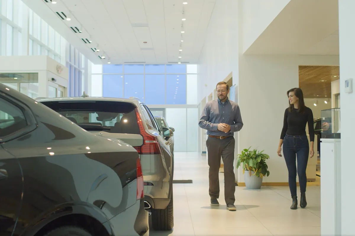 Order with confidencex Volvo Salesman discussing options with a customer