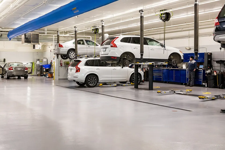 Lovering Auto Group Lovering service bay with Volvos on lifts