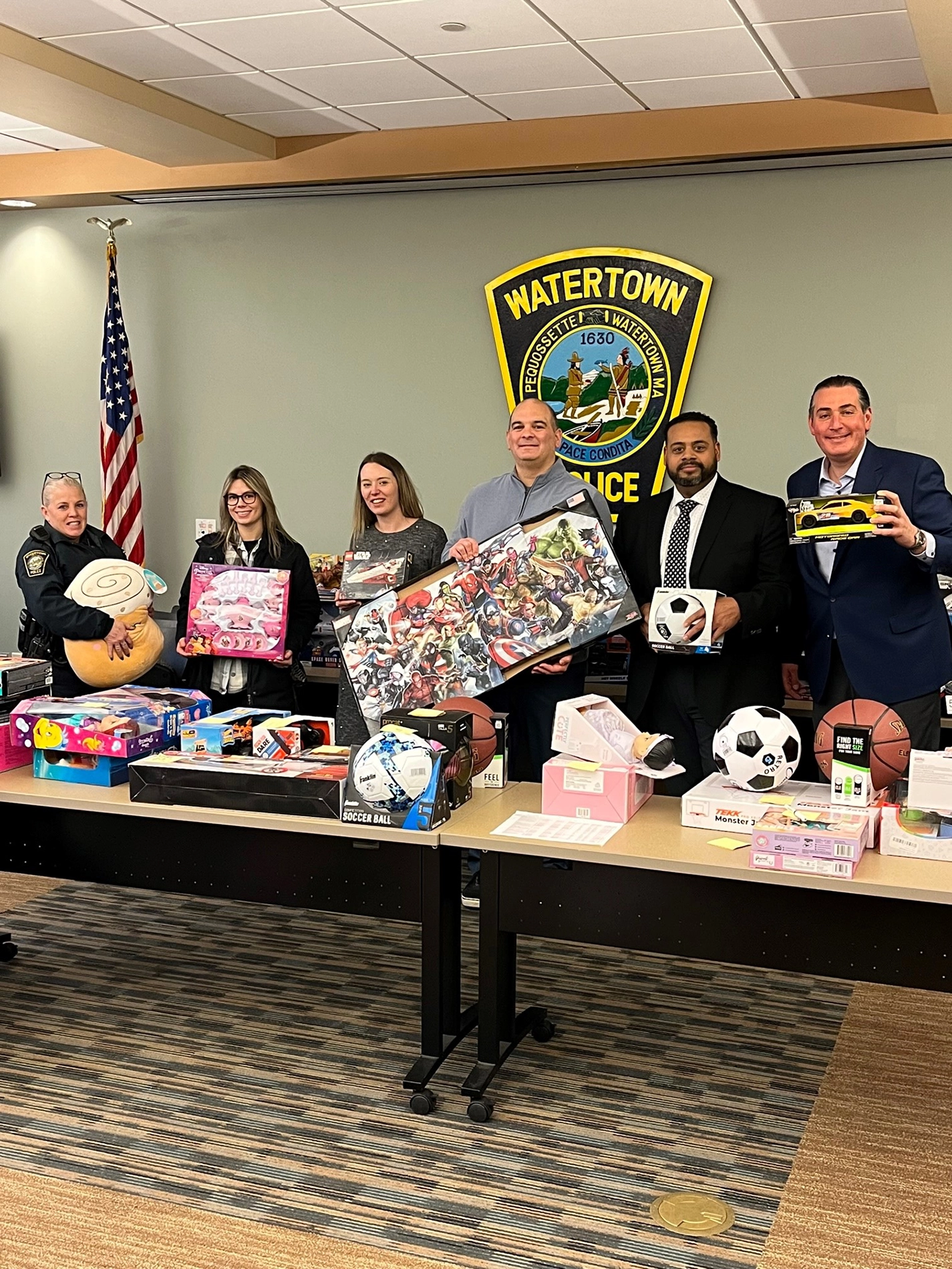 Lexus of Watertown Staff posing in front of the toy drive