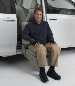 Man sitting in an Auto Seat in the Toyota Sienna