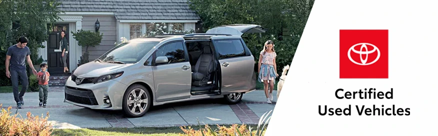 2023 Sienna parked in front of a single family home with family around the car.
