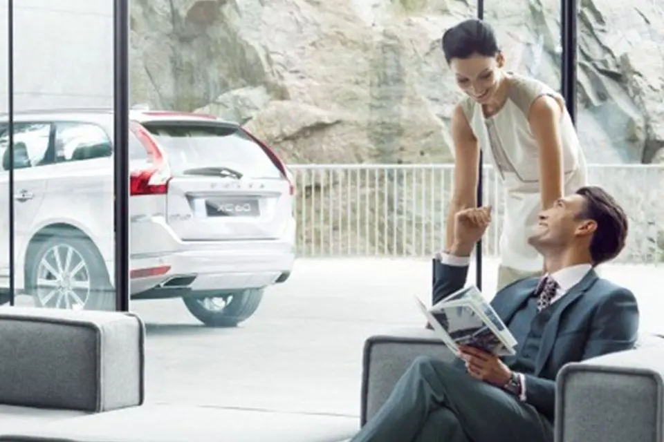 Buy From Home - Paperwork Couple At Home With New Volvo
