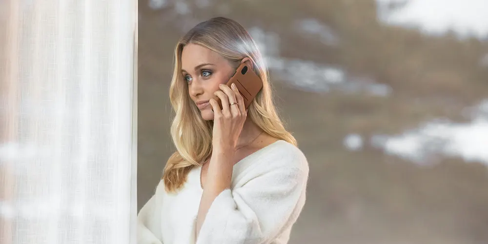 Volvo Orange County Customize Your Deal Girl talking on the phone