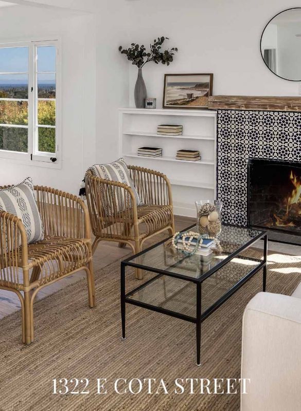 living room chairs and table near fireplace