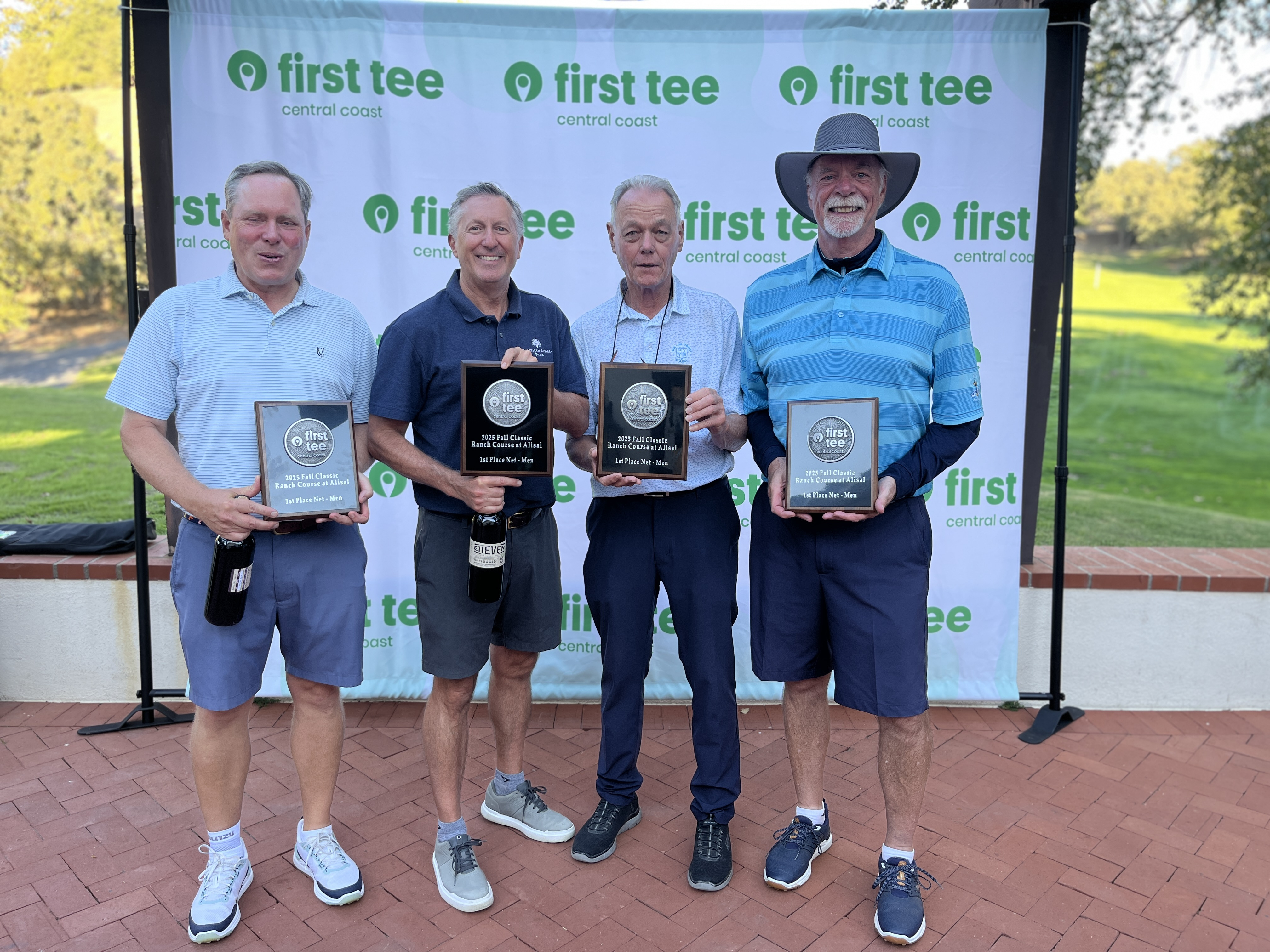 First Tee Central Coast Fall Classic Winners holding champion plaques made by Malcolm DeMille