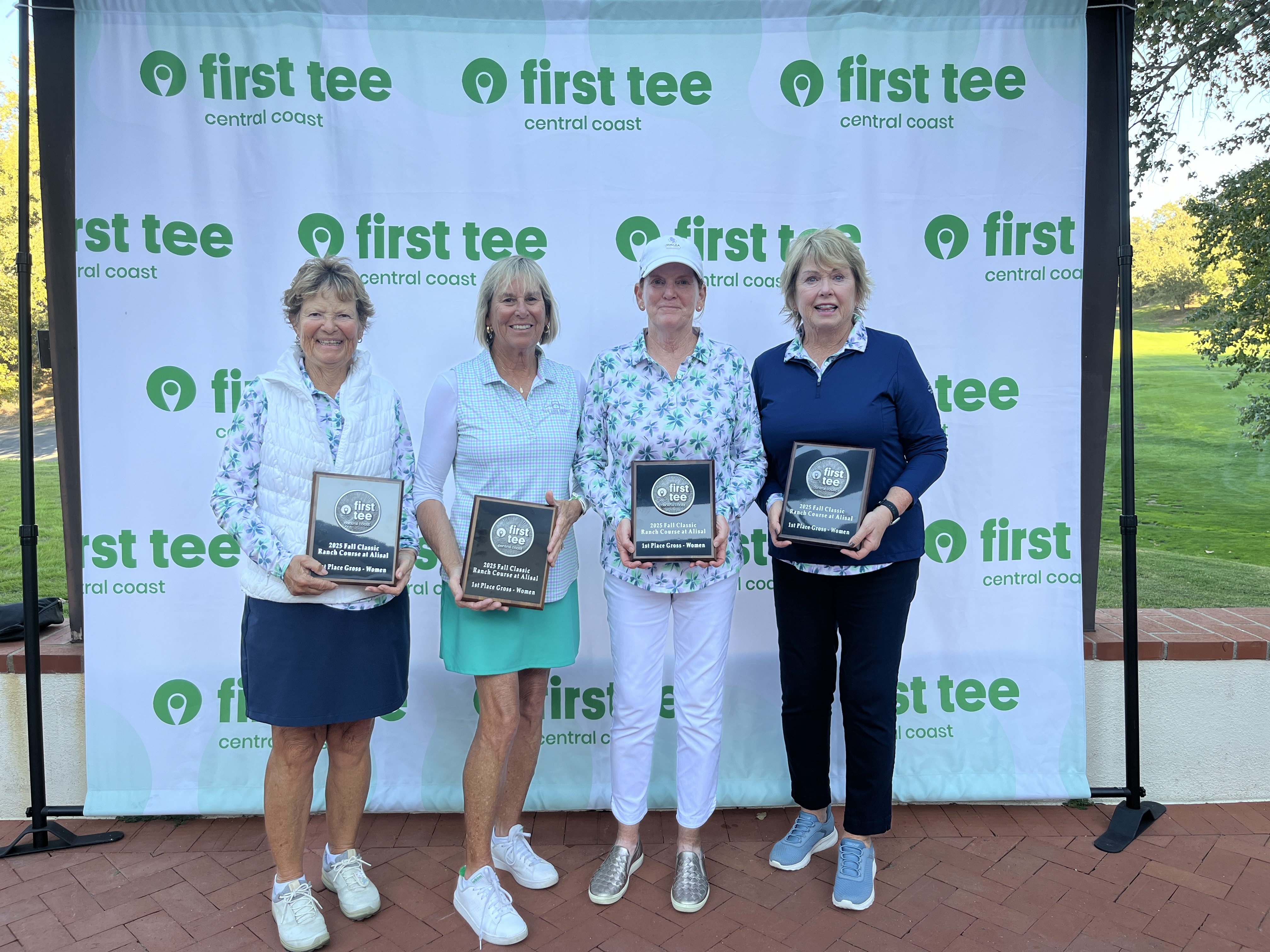 First Tee Central Coast Fall Classic Ladies Winners holding champion plaques made by Malcolm DeMille