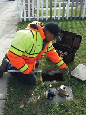 Photo of MPWD crew working on an AMI meter installation
