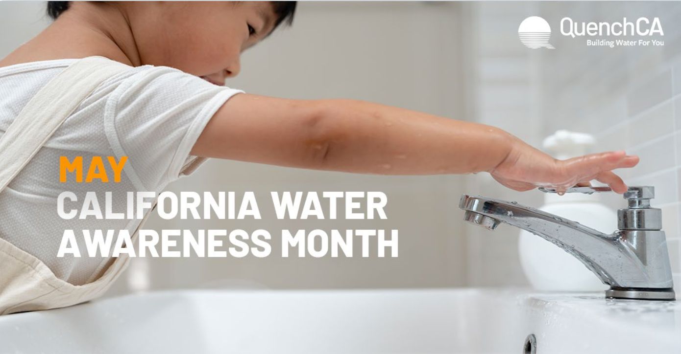 Image showing child turning on a water faucet.