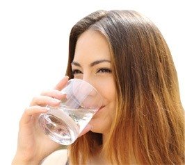 water quality image of woman drinking water from a glass