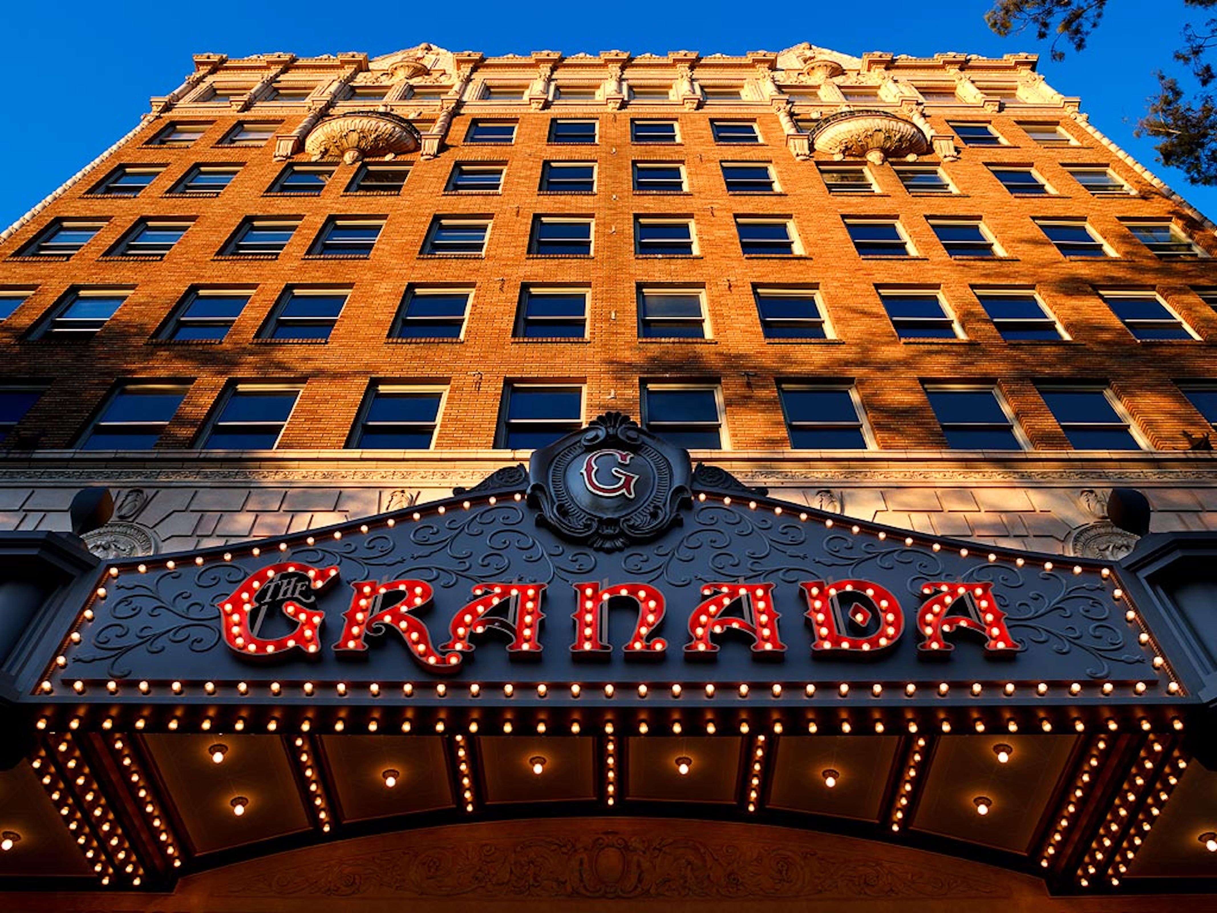The exterior of the Granada Theater in Santa Barbara looking up.