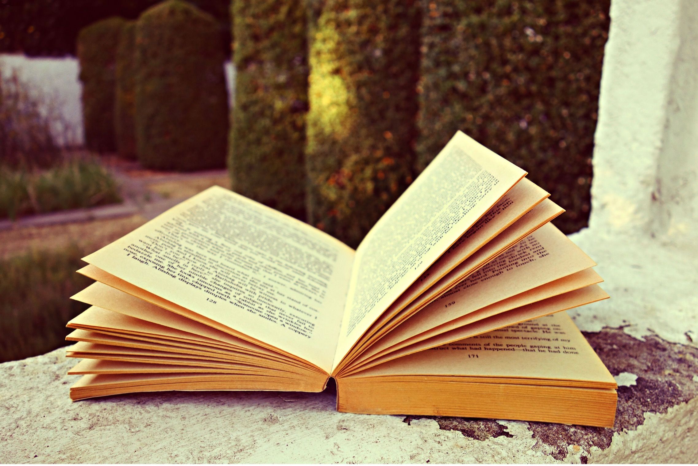An open book on a table.