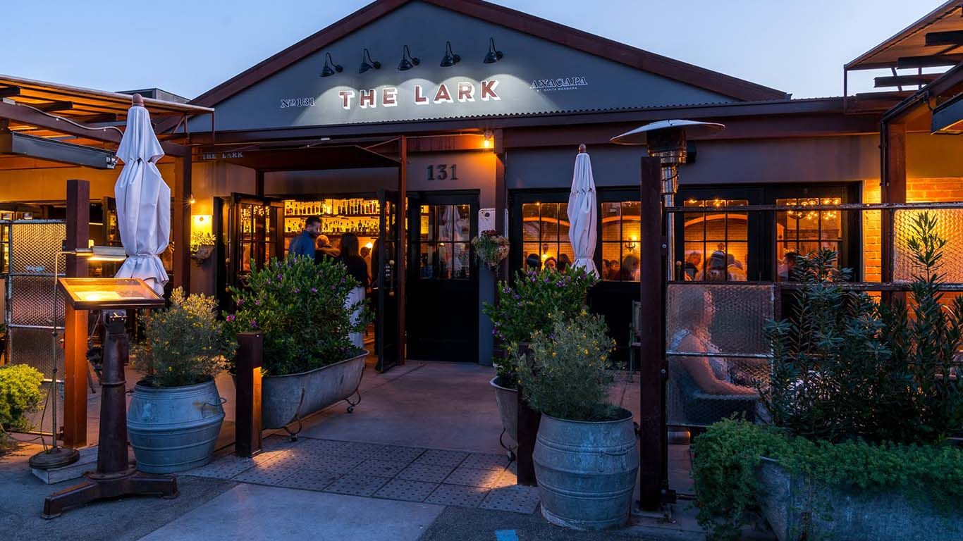 The front of the Lark restaurant in Santa Barbara with it's outdoor patio in front of large windows