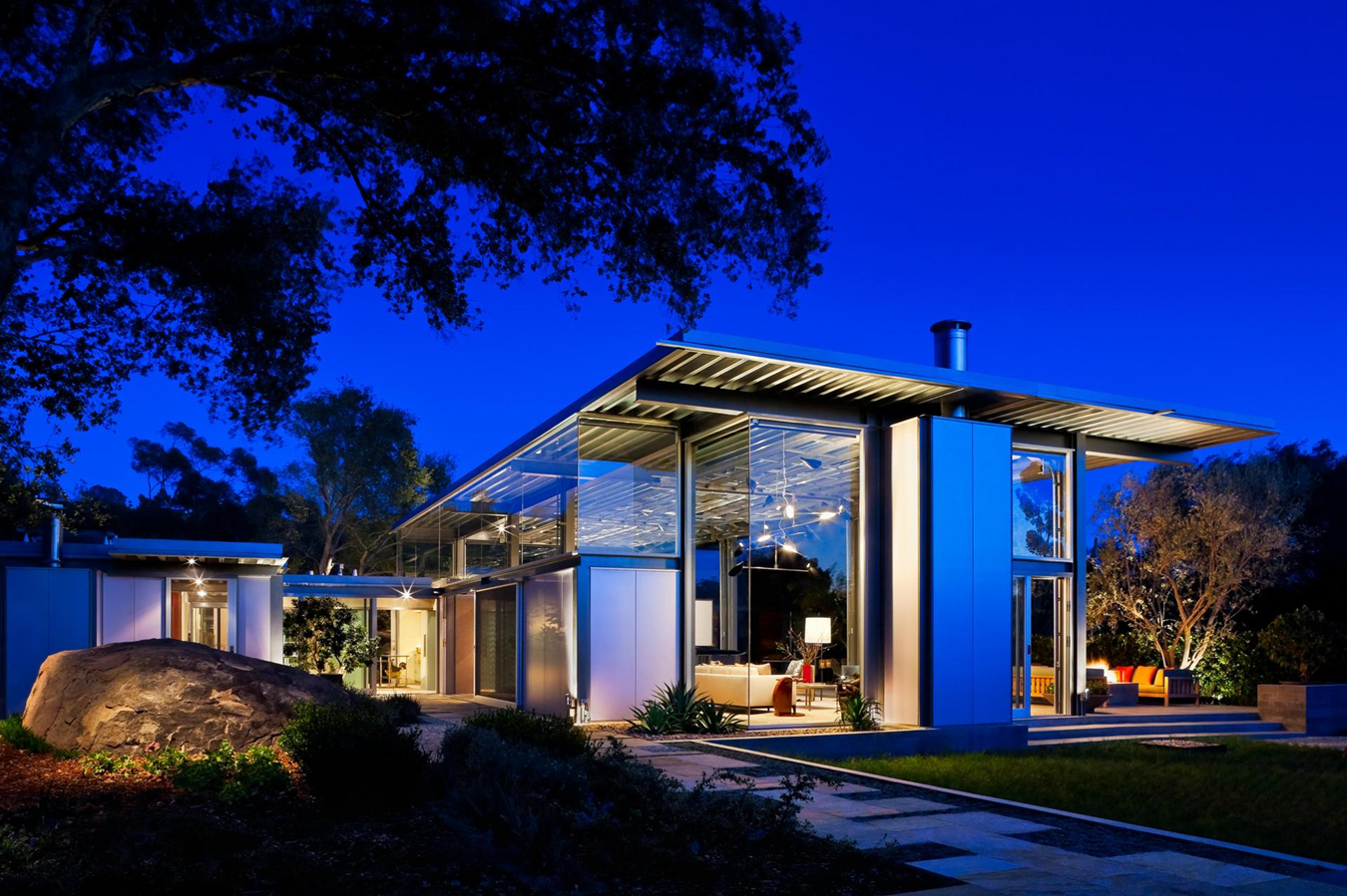 Luxury home featuring walls of glass for indoor outdoor living at its finest