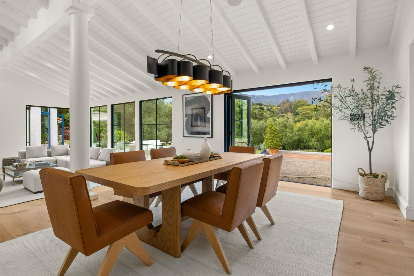 A luxury dining room in warm neutral colors.