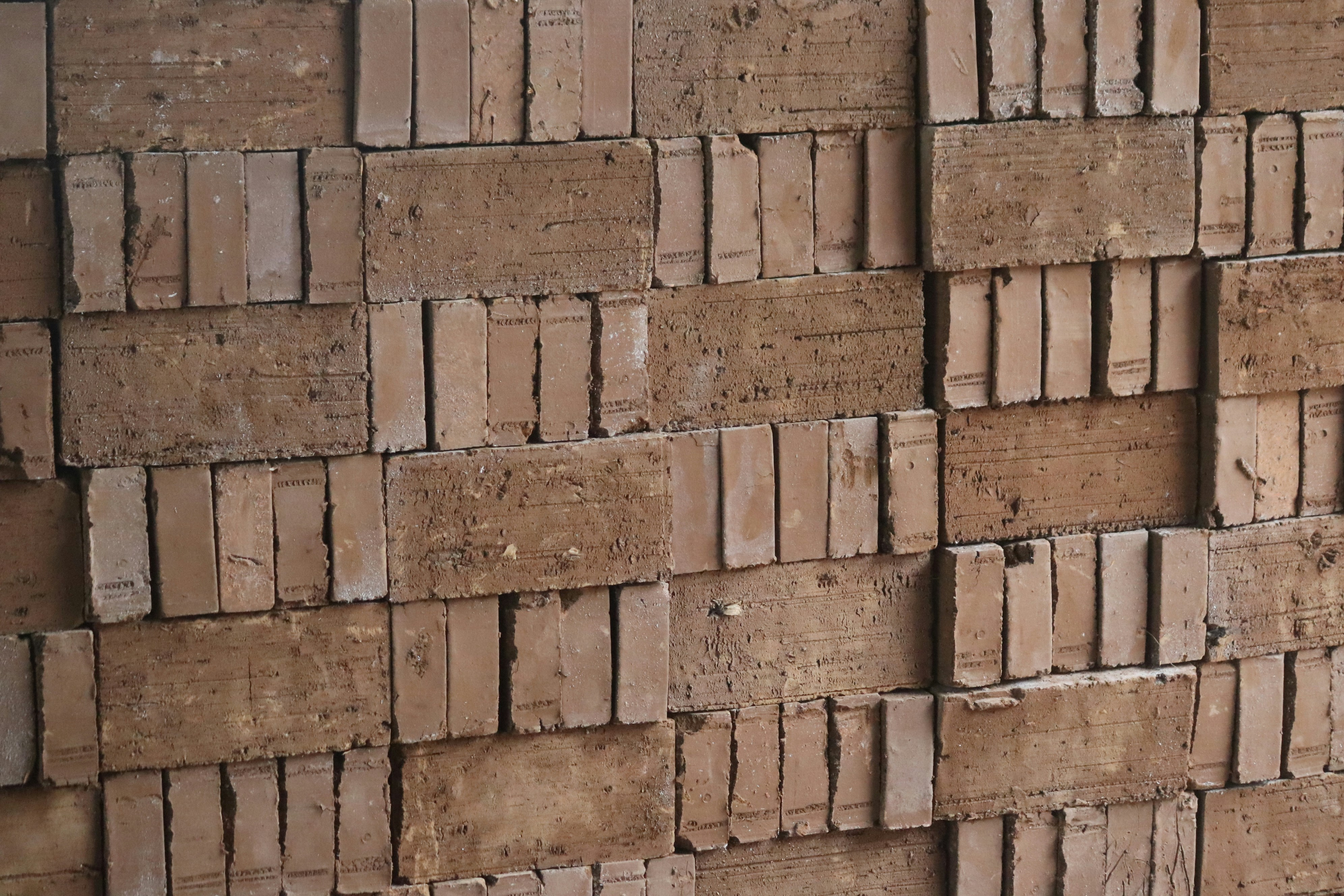 A stack of recycled bricks filling the photo's frame.