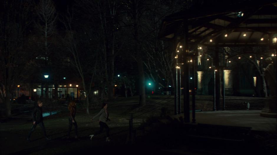 Dot rushes up to the gazebo as Jace and Clary follow her.