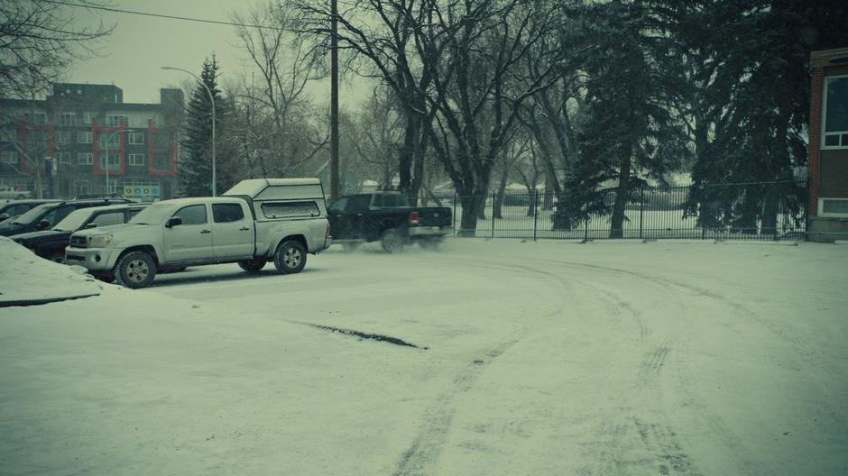 Juan Carlos's truck speeds out of the parking lot.