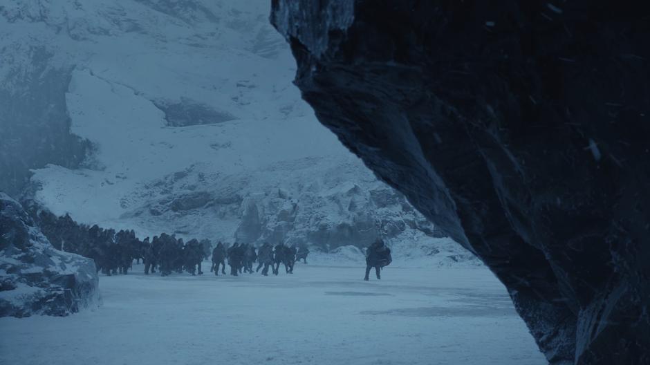 One of the wildlings runs across the ice with the army of the dead in hot pursuit.