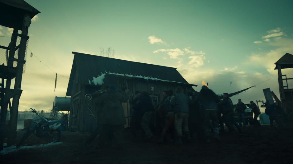 Revenants surround the barn and try to bust their way inside.