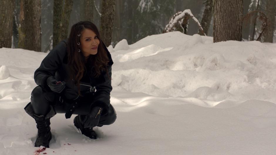 Maze looks up and smiles after finding a trail of Ben Rivers's blood in the snow.