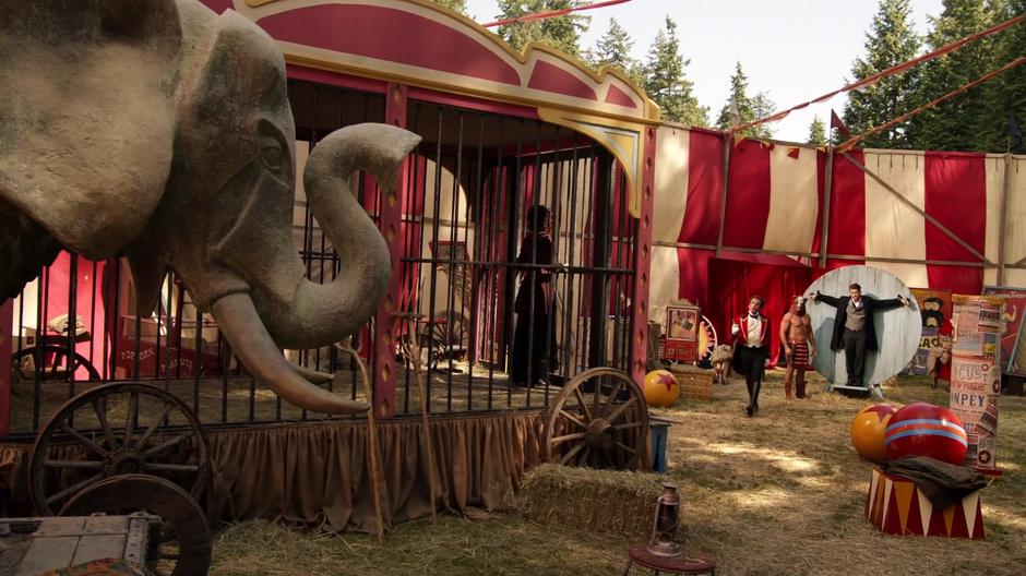 P.T. Barnum  has Nate strapped up to test his powers while Amaya is locked in a cage.