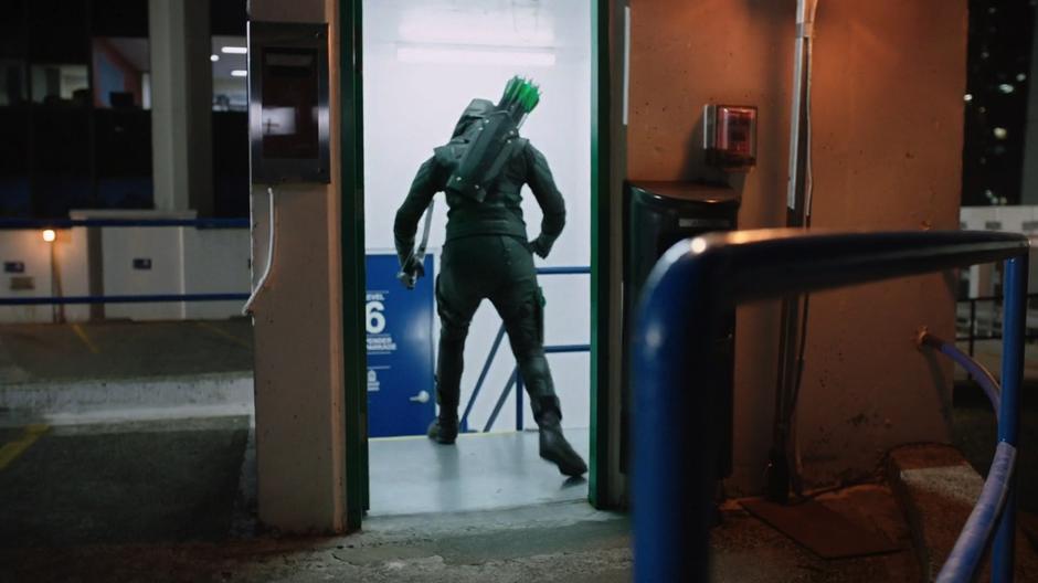 Diggle rushes into one of the stairwells after Faust.