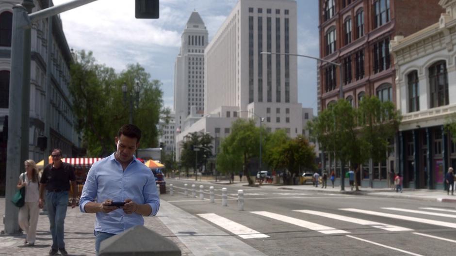 Dan waits for the fake kidnapping on the side of the road.