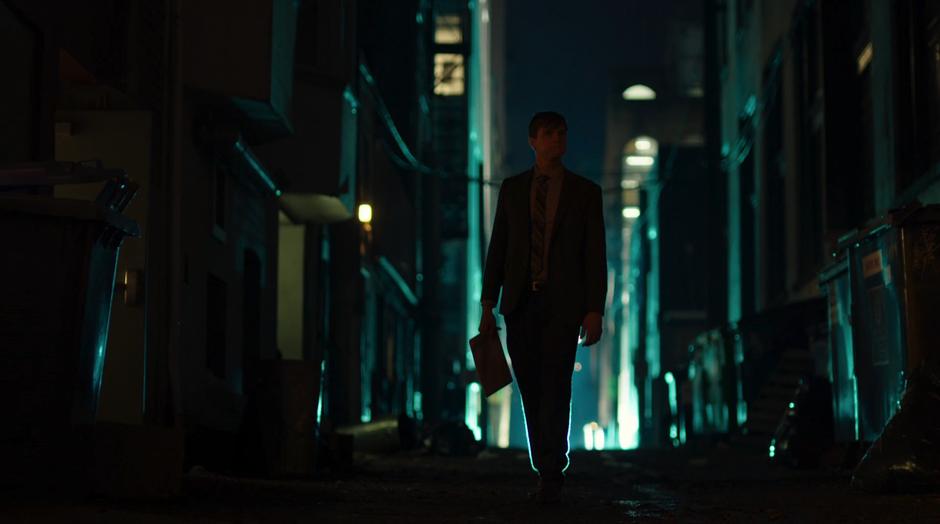 Ralph Dibny waits for Mayor Bellows in the dark alley.