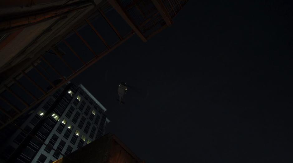 The mayor's helicopter flies over the alley.