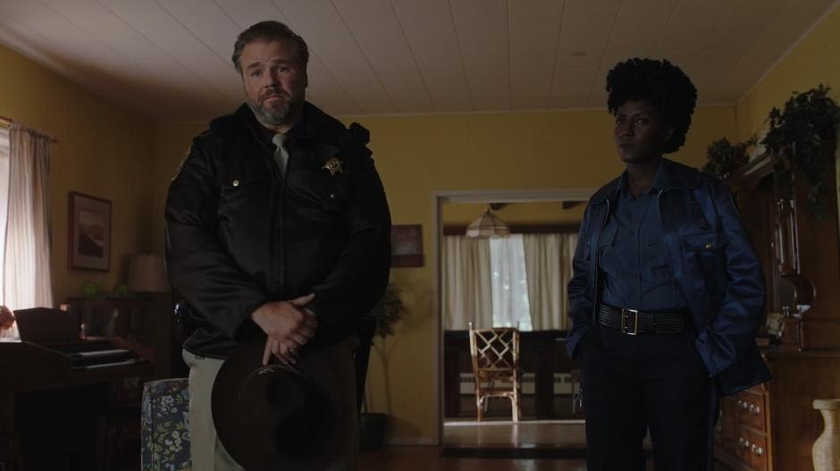 Sheriff Hobbs and Farah listen to Suzie Boreton's lies about her son.