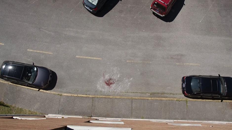 Priest looks out the window and sees the blood of Suzie Boreton on the ground.