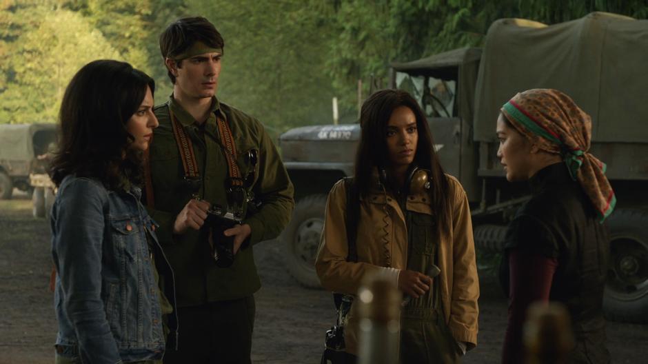 Zari, Ray, and Amaya talk with Anh Ly about the creature.