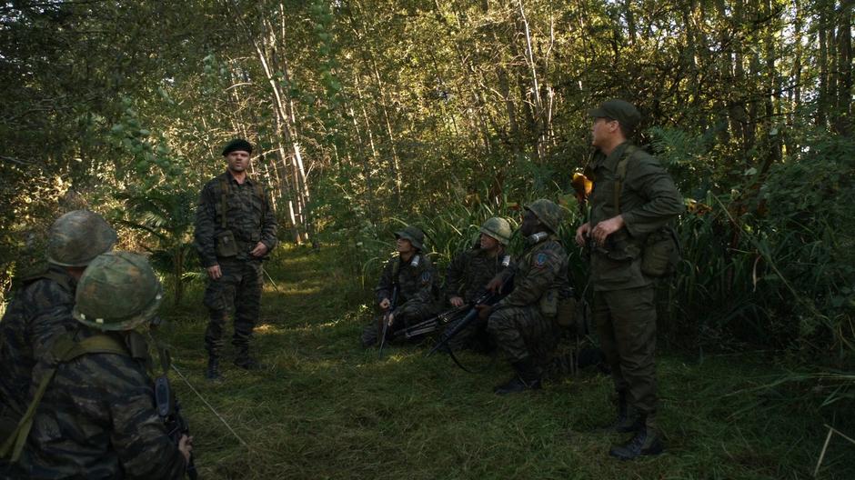 Dick Rory briefs his soldiers on the attack on the camp.