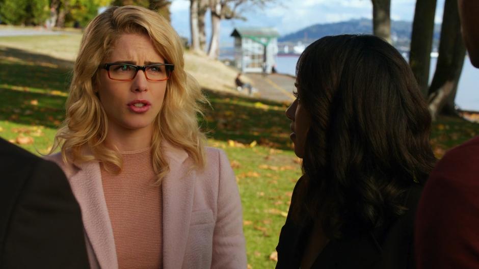Iris looks at Felicity as she interrupts to wedding to propose to Oliver.