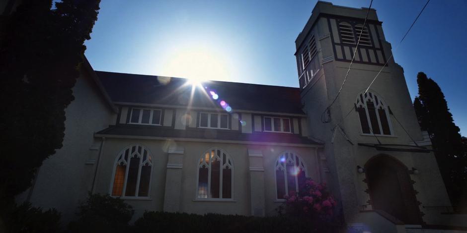 Establishing shot of the side of the church.