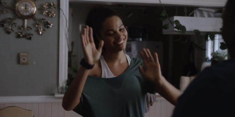 Carly dances with Jeffrey after exercise.