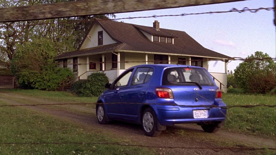 The Blueberry drives up to the front of the farmhouse.