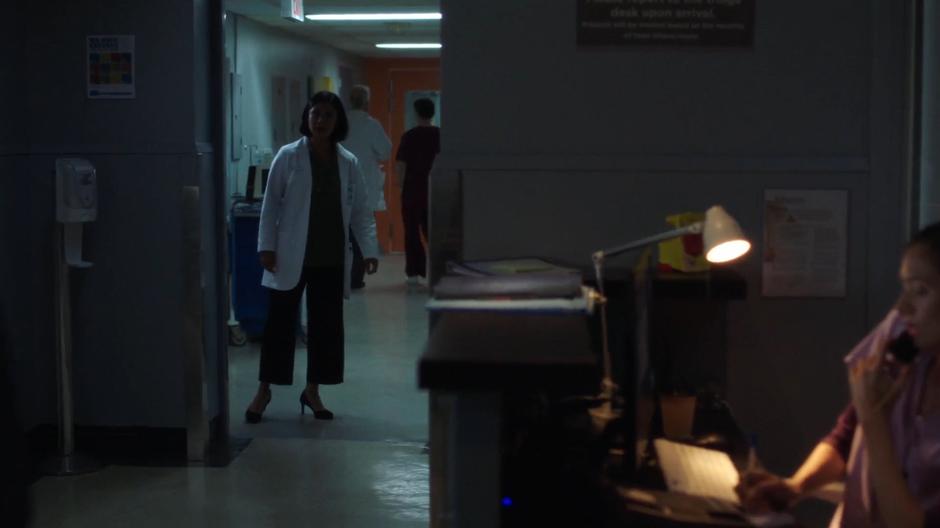 Dr. Joyet walks into the ward in the evening.