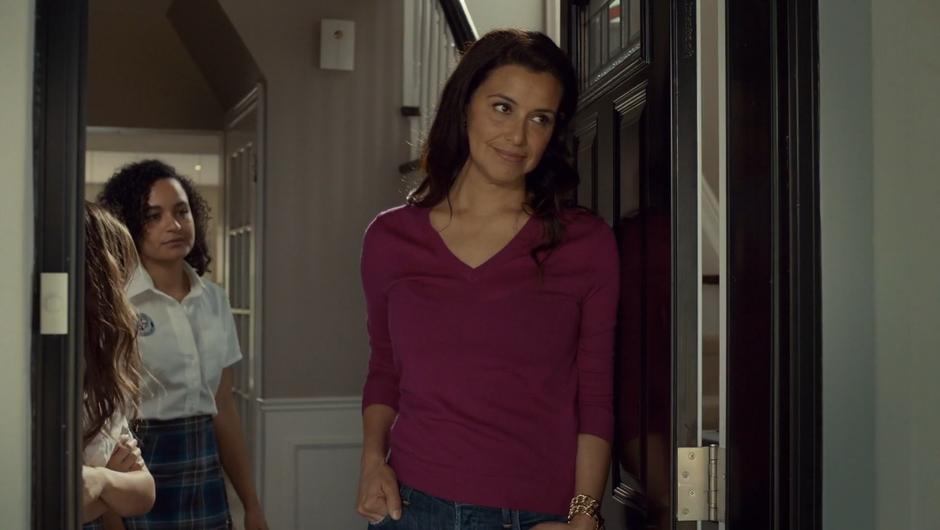 Louise watches Mary leave while Naomi and Heather stand inside the door.