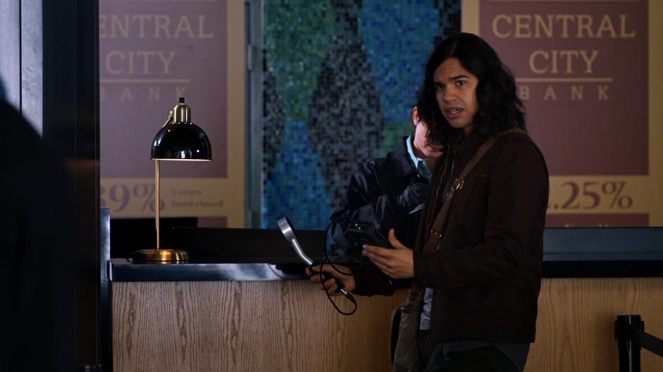 Cisco turns to Joe and tells him about the radiation.